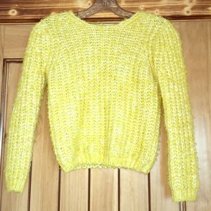 A yellow youth sweater.